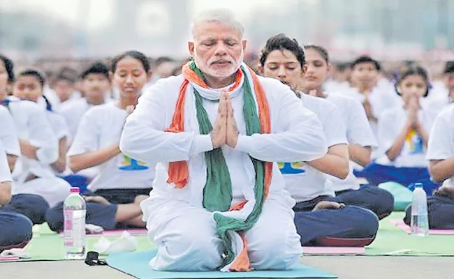 PM Narendra Modi Says Yoga Is Helping Covid-19 Patients Defeat Disease - Sakshi