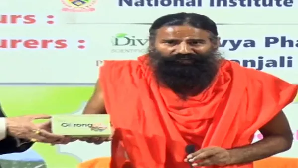 Maharashtra Minister Warns Ramdev On Coronil - Sakshi