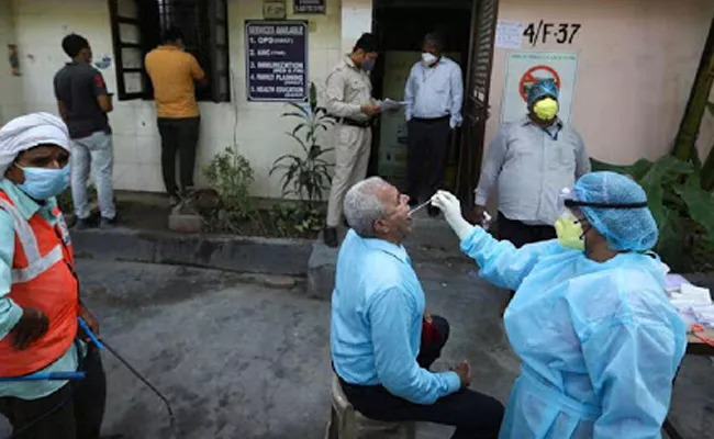 70 Workers In Mask Making Unit Tests Coronavirus Positive In Puducherry - Sakshi