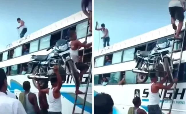 Video Viral: Man Climbs Ladder With A Bike on His Head - Sakshi