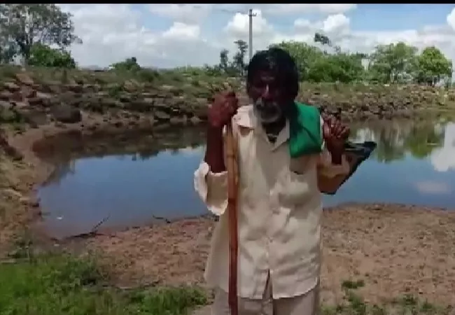 Octogenarian Shepherd from Karnataka Applauded by PM Modi in Mann ki Baat - Sakshi