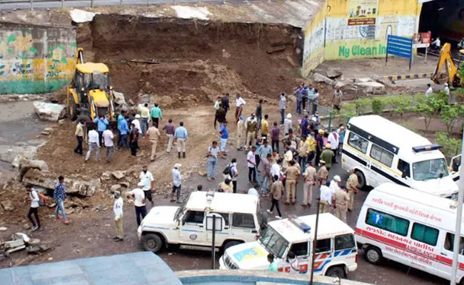 Two Deceased After Wall Of Bridge Collapsed Near Aji Dam - Sakshi