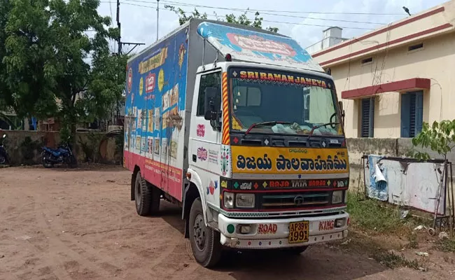 Liquor Bottles Are Moving In TDP Leader Milk Van - Sakshi