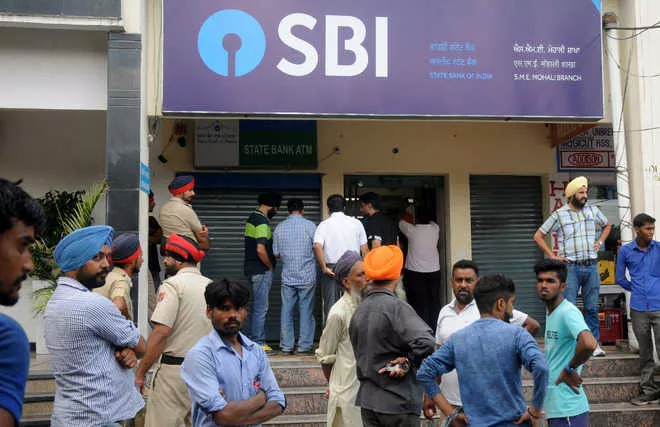 Son of ex-bank staffers among three held for running fake SBI branch - Sakshi