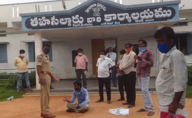 Youngmen Commits Suicide Attempt Infront of Tahsildar Office - Sakshi