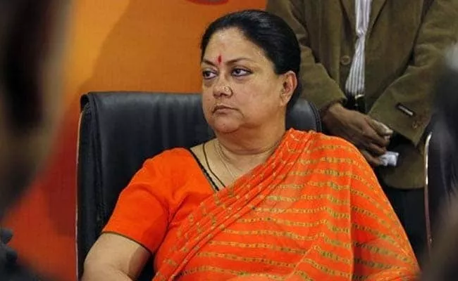 BJP Ally Vasundhara Raje Asked Congress MLAs To Support Ashok Gehlot - Sakshi