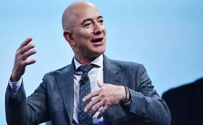 Jeff Bezos wealth hits record high usd171B - Sakshi