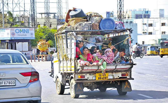 People return to their home towns due to Corona  - Sakshi