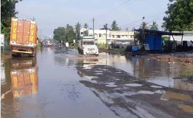 Natuinal Highway 216 Damaged in Rainy Season West Godavari - Sakshi