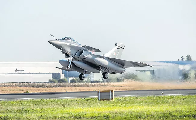 Five Rafale jets leave for India - Sakshi