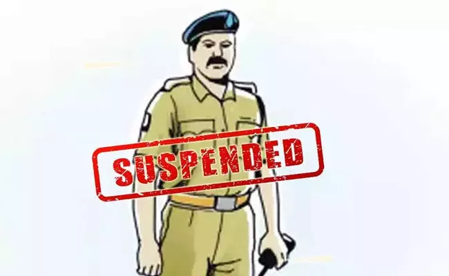 Two constables suspended in Adilabad - Sakshi