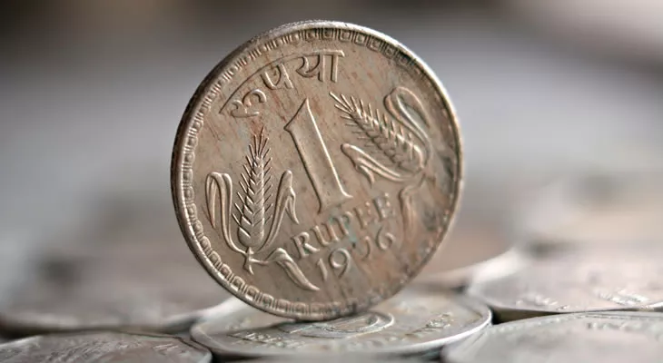 Rupee trades higher 74.69 at per dollar - Sakshi