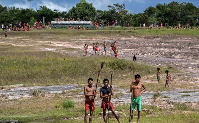 Amazon Tribe Released Six Men Ecuador Government Give The Body Of Their Leader - Sakshi