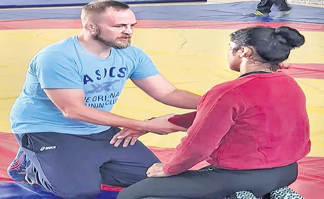 Indian Womens Wrestling Coach Andrew Cook Wants Explanation About His Suspension - Sakshi