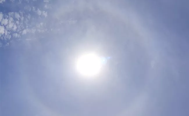 Rainbow Circle Caught on Sun in East Godavari - Sakshi