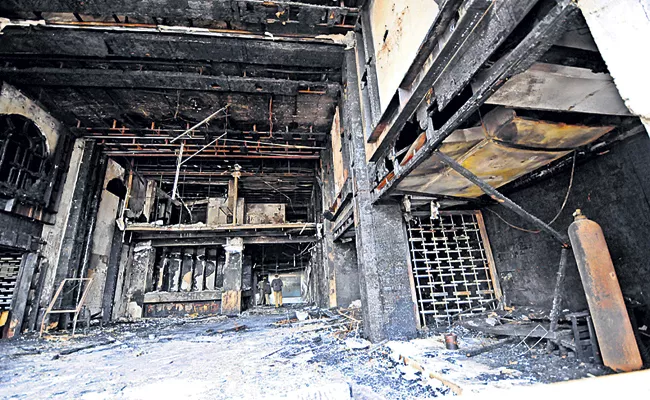 There is not a single device that can prevent a fire from happening in Swarna Palace - Sakshi