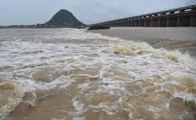 Prakasam Barrage 60 Gates Lifted In Krishna District - Sakshi