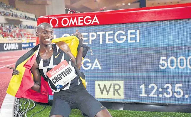 Joshua Cheptegei Made World Record In Five Thousand Meters At Monaco Track Meet - Sakshi