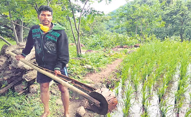 Tribal Farmer Innovate Local Made Wooden Machine - Sakshi