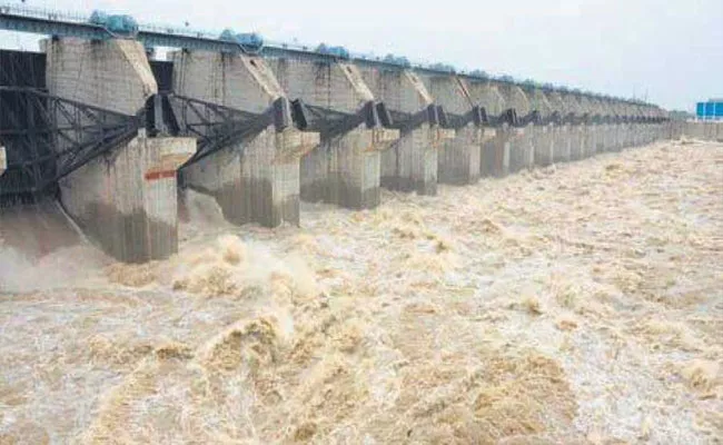 Prakasam Barrage Open 70 Gates Lifted In Vijayawada - Sakshi