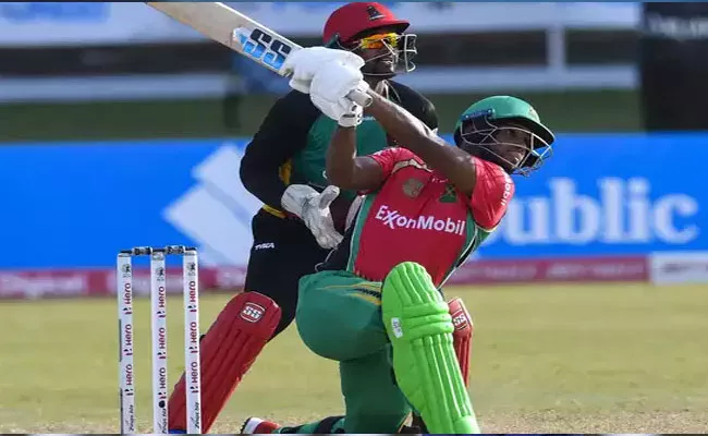 Pooran Blows Away St Kitts With 45 Ball 100 - Sakshi