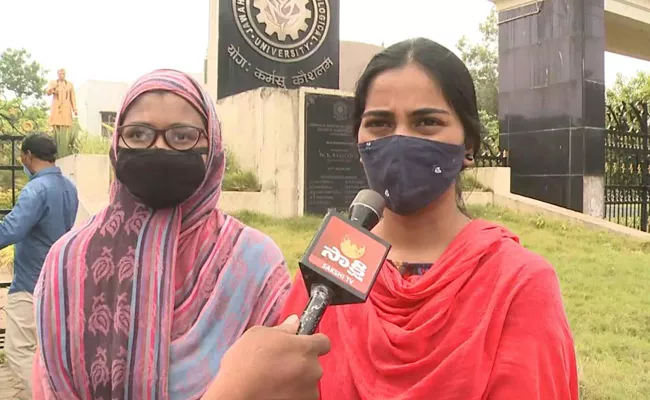 Two B Pharmacy Students Protest At JNTU To Allow For Exams - Sakshi