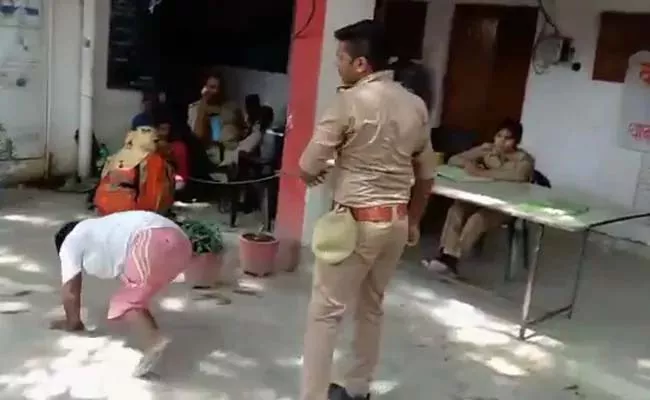 UP Cop Drags Differently Abled Man - Sakshi