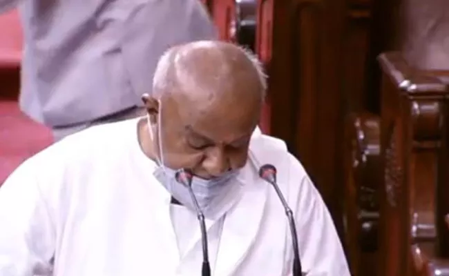 HD Deve Gowda Takes Oath As Rajya Sabha Member after 24 years - Sakshi