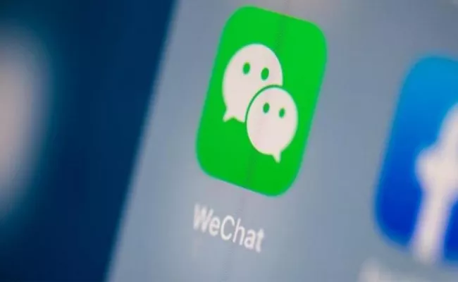 US court halts ban on WeChat download amid Trump tech battle with China - Sakshi