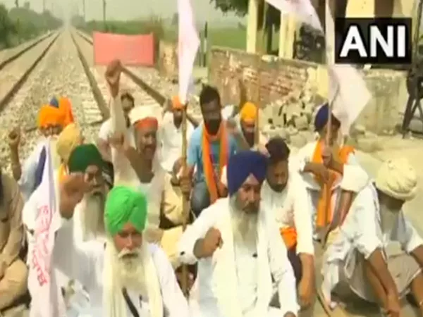 Farmers Hold Rail Roko In Amritsar In Protest Against Farm Bills - Sakshi