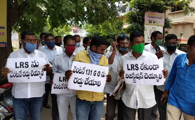 Realtors Protest That Govt Should Reconsider New Land Regularization - Sakshi