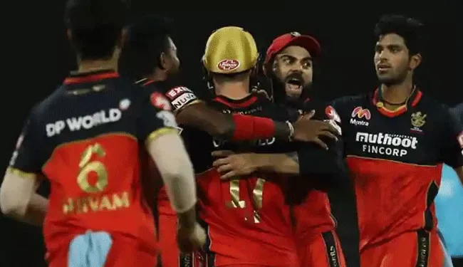 RCB Beat KKR By 82 Runs - Sakshi