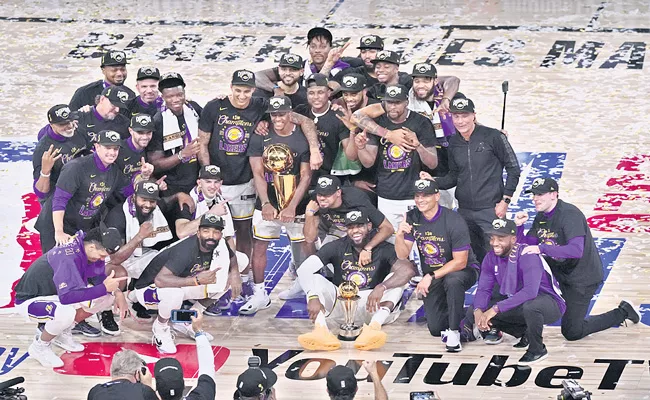 Los Angeles Lakers beat Miami Heat to claim record - Sakshi