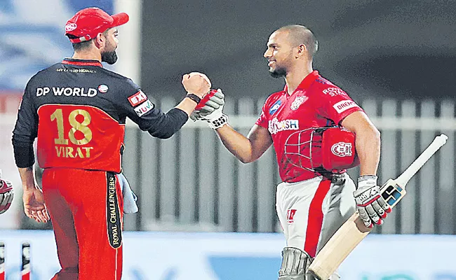 Kings XI Punjab beat Royal Challengers Bangalore by 8 wickets - Sakshi