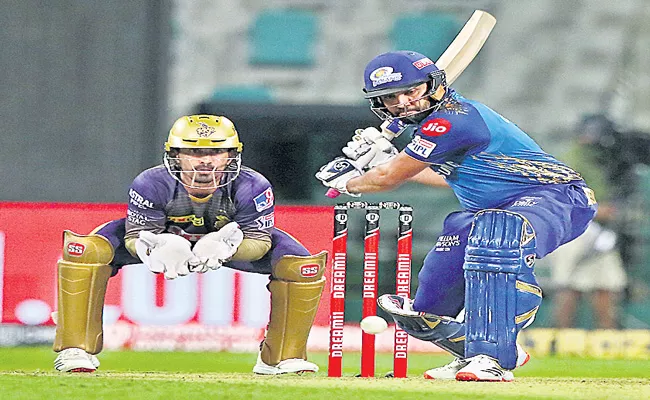 Mumbai Indians beat Kolkata Knight Riders by 8 wickets - Sakshi