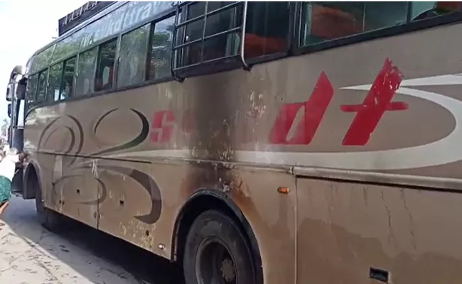 Smoke Comes From Private Travels Bus Near vijayawada - Sakshi