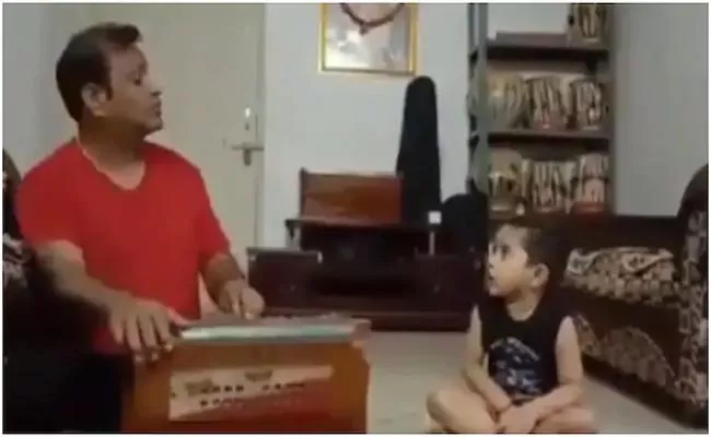 Little Boy Sings Classical Song By Harmonium Became Viral - Sakshi