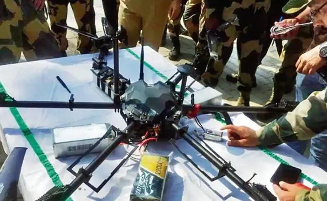 Security Forces Shoot Sown Pakistan Armys China-made Quadcopter  - Sakshi