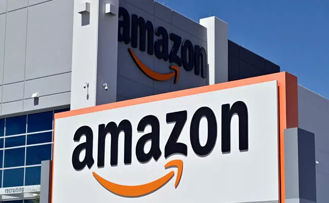  Amazon wins interim relief Future-Reliance deal put on hold - Sakshi