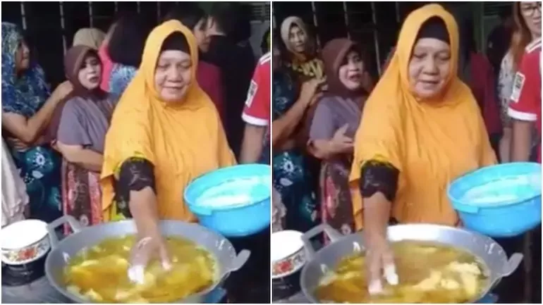 Viral Video Woman Dipping Her Hand in Hot Oil to Fry Food - Sakshi