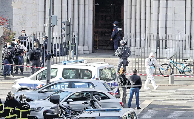 Three dead as woman beheaded in knife attack at French church - Sakshi