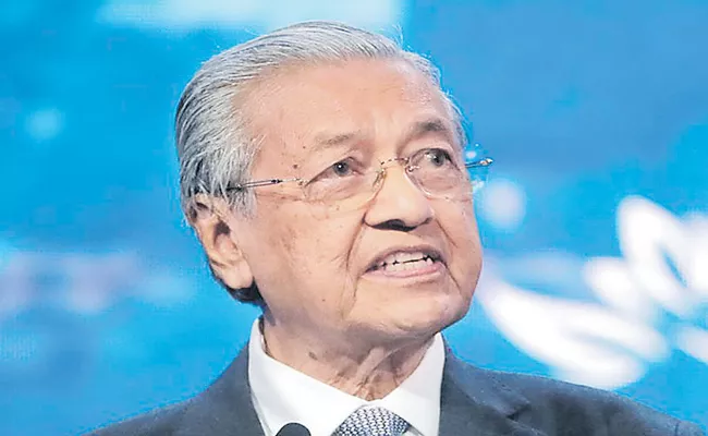 Malaysian Prime Minister tweet that said Muslims have the right to kill - Sakshi