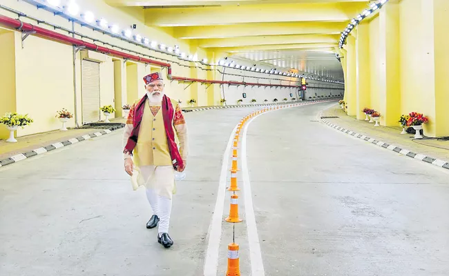 PM Narendra Modi inaugurates world longest highway tunnel - Sakshi