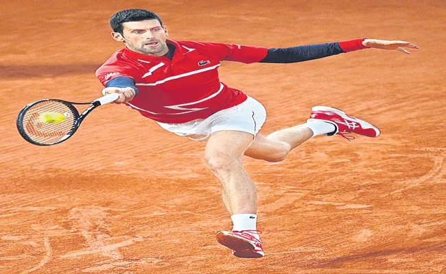 Novak Djokovic Reaches 14th Roland Garros Quarter final - Sakshi