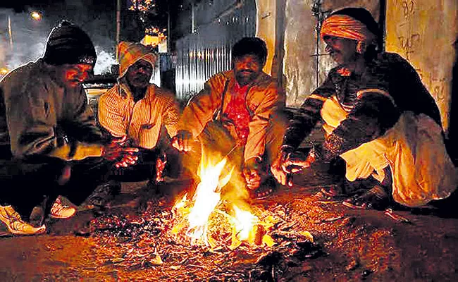 Night temperatures in the state recorded 2 to 5 degrees lower - Sakshi