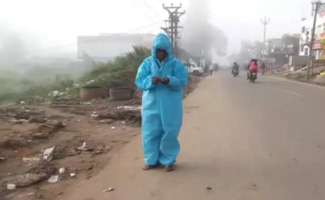 Man Hulchal With PPE Kit In Paderu Vizag - Sakshi