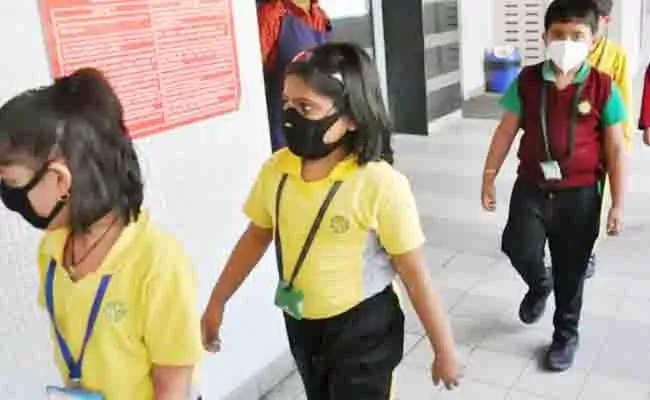 Schools Reopen with Odd Even System in Assam - Sakshi