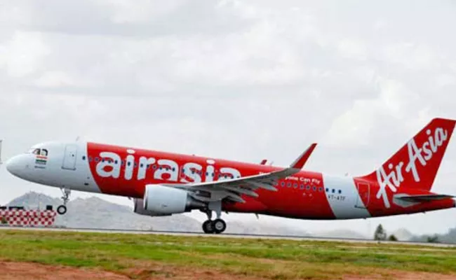 Tata group may invest in AirAsia through equity, debt - Sakshi