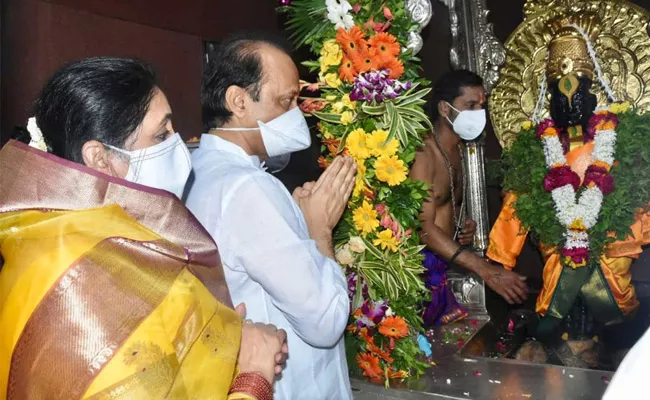 Prayers for Covid-19 vaccine: Ajit Pawar visits Pandharpur temple - Sakshi