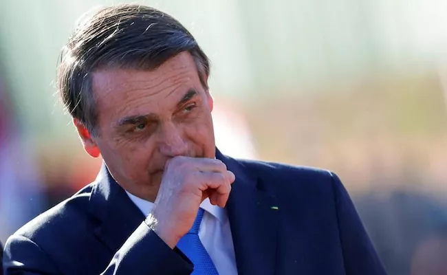 Wont take vaccine: Brazil president Bolsonaro - Sakshi